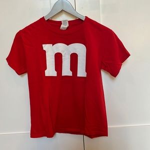 This M&M shirt has only been worn once and is in perfect condition